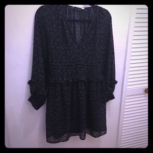 Black ruffle dress with subtle floral print